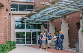 Students standing outside JIBC main building
